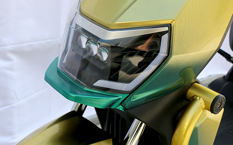 Electric Motorcycle | Highlight Headlight Feature Electric motorcycle high-penetration LED headlight close-up, bright light for safer nighttime riding