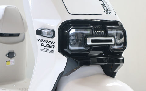 Electric Scooter | Highlight Dual LED Headlight Detail Highlight dual LED headlight of white electric moped, strong penetration light for safe night riding
