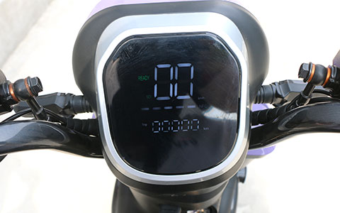 Purple Electric Scooter | HD Digital Dashboard Detail HD LCD digital display for purple electric scooter, showing real-time speed, battery level and mileage clearly